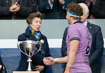 princess anne at the rugby in a scarf