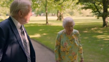 David Attenborough walking with Queen 