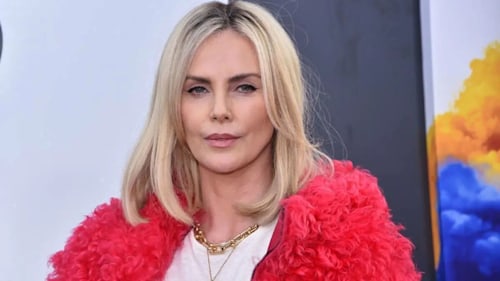 Charlize Theron stuns at Super Bowl in casual chic attire