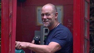 mike tindall laughs in phone booth