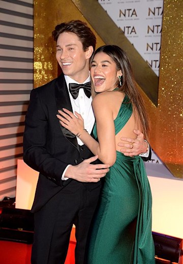Joey Essex and Lorena Medina laugh and hug at NTAs