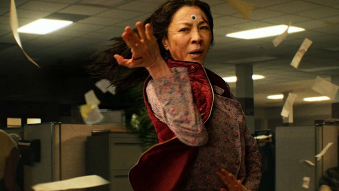 Michelle Yeoh with goggle eye on forehead while fighting