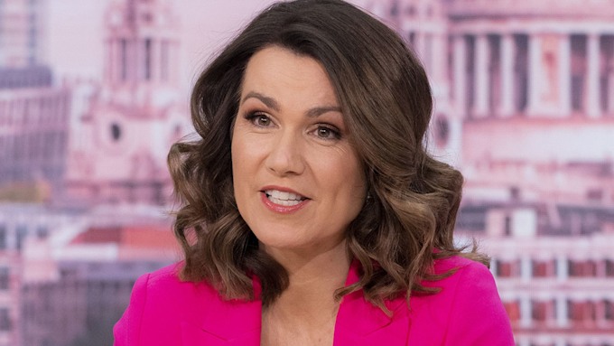 Susanna Reid wearing a bright pink blazer on Good Morning Britain. 