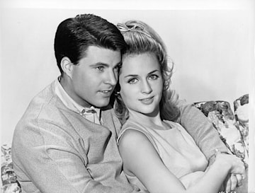 Ricky Nelson and Kristin Harm cuddle up for a photo. 