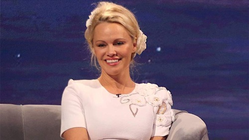 Pamela Anderson shows off sophisticated makeunder – as she discusses friendship with Julian Assange