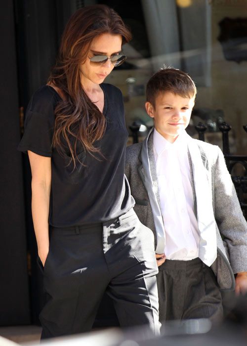 Victoria Beckham steps out with long hair extentions after visiting the