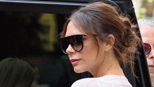 Victoria Beckham rocks the Meghan Markle 'messy bun' as she heads out in New York - while husband David arrives in Tokyo
