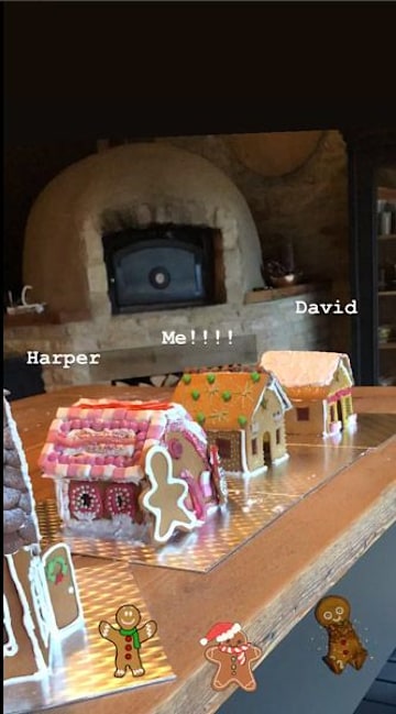 A line up of Victoria, David and Harper Beckham's ginger bread houses