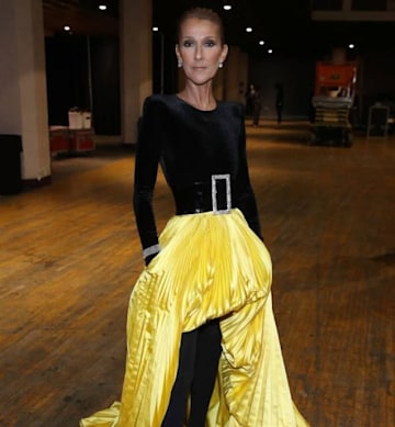 Celine Dion wows in a bright yellow skirt ahead of her health battle