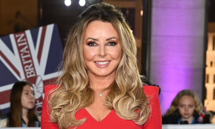 Carol Vorderman wows in tiny workout top as she learns to do the splits ...