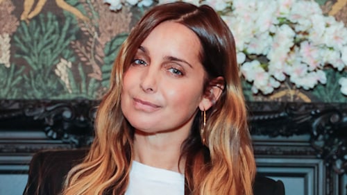 Louise Redknapp shows off her unreal abs in stylish sports bra and leggings