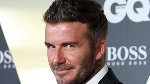 David Beckham shows off incredible physique as he takes icy dip