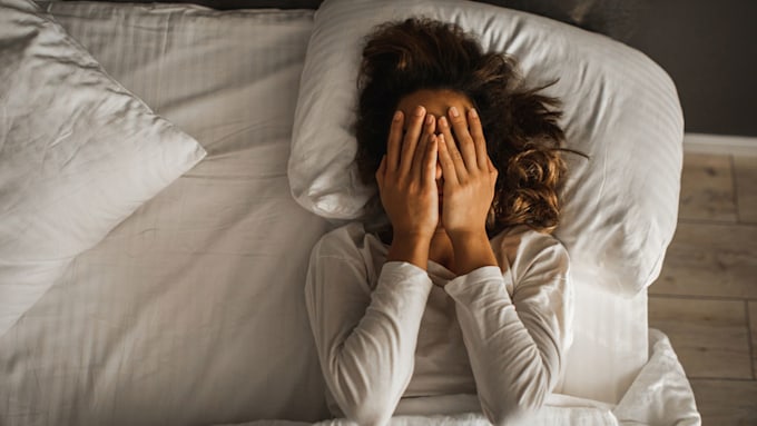 woman struggling to sleep