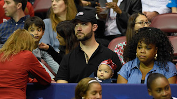 Alexis Ohanian holding baby Alexis