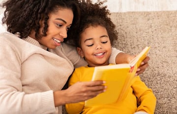 mother and daughter reading a story