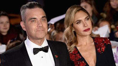 Robbie Williams' daughter Coco dresses up in mum Ayda's heels - and it's the cutest