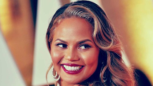 Chrissy Teigen shows off blossoming baby bump in sweet snaps taken by son Miles
