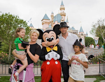 Deborra-Lee Furness and Hugh Jackman with Ava and Oscar at Disneyland in 2009