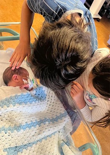 Sophie McCartney's children meet newborn baby brother