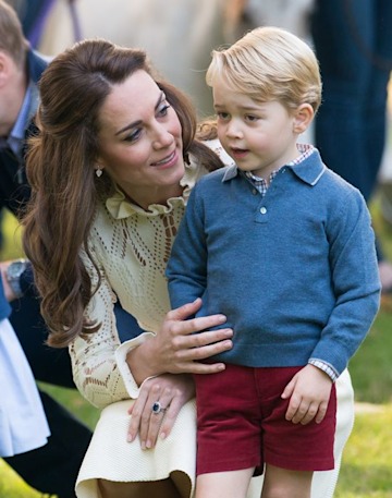 Princess Kate kneels beside Prince George