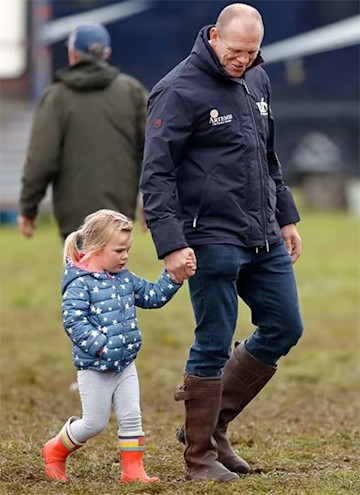 Mia Tindall walks with dad Mike