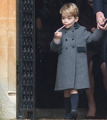 Prince George sucks on candy cane