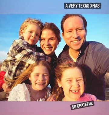 Jenna Bush Hager smiles with her three children and husband 