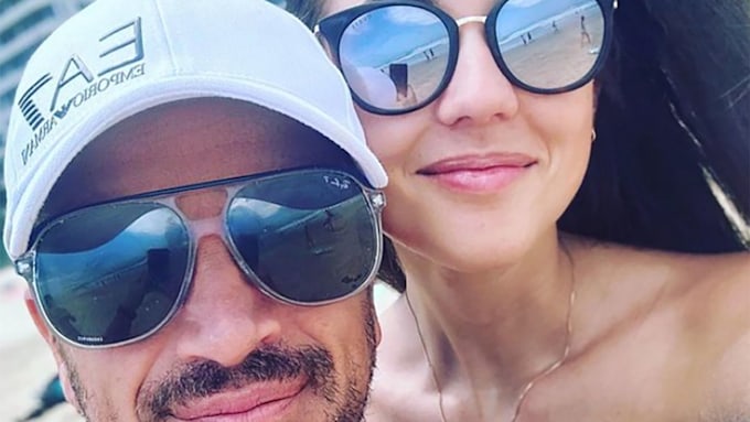 Peter Andre and wife Emily in shades