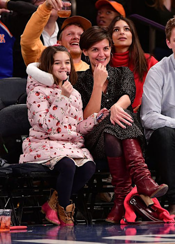 Katie Holmes and daughter at sports game