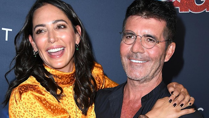 Lauren Silverman and Simon Cowell smiling