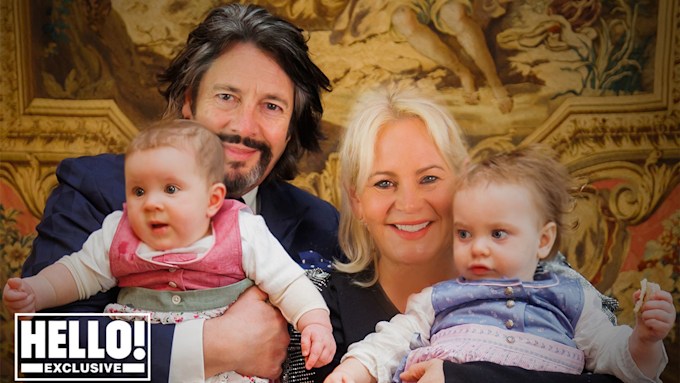 Laurence Llewelyn-Bowen poses with his two granddaughters