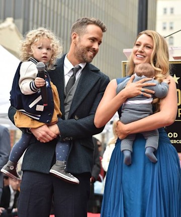 blake lively and ryan reynolds with their children on the red carpet 