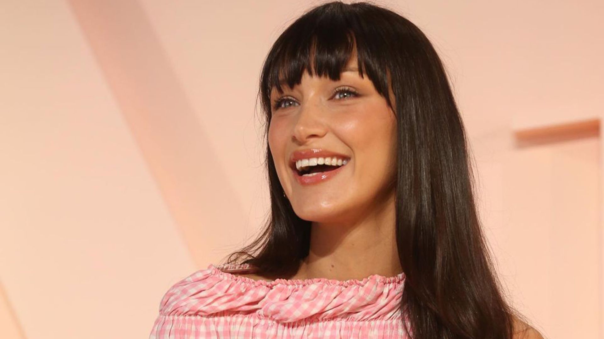 Bella Hadid channels Dolly Parton in a vintage pink gingham dress – see ...