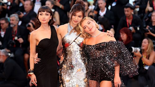 Gemma Chan supports Florence Pugh on the Venice Film Festival red carpet in dazzling gold gown