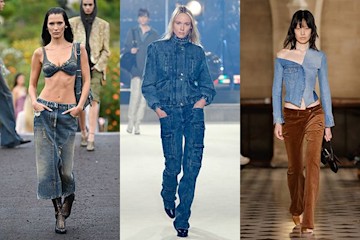 Three models wearing denim on the runway 