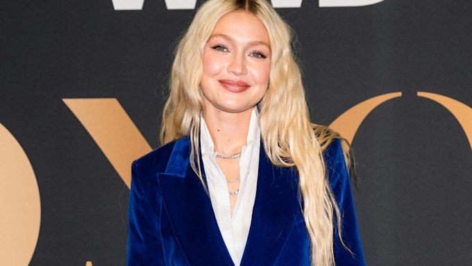 Gigi Hadid channels Austin Powers in a blue velvet suit at the 2022 WWD ...