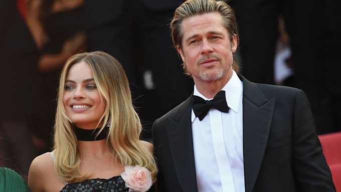 margot robbie and brad pitt at cannes film festival for once upon a time in hollywood