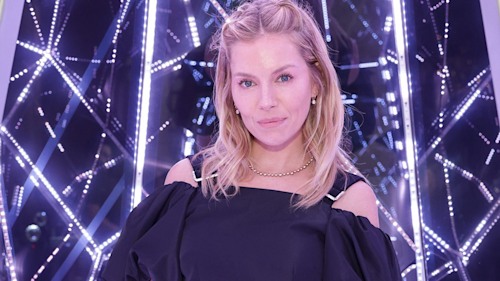 Sienna Miller rocks the most striking 80s-inspired accessory at Claridge's annual Christmas tree party