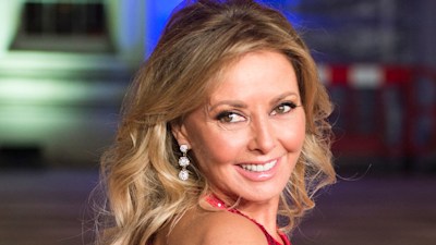 Carol Vorderman poses for selfie in grand library at Bristol home