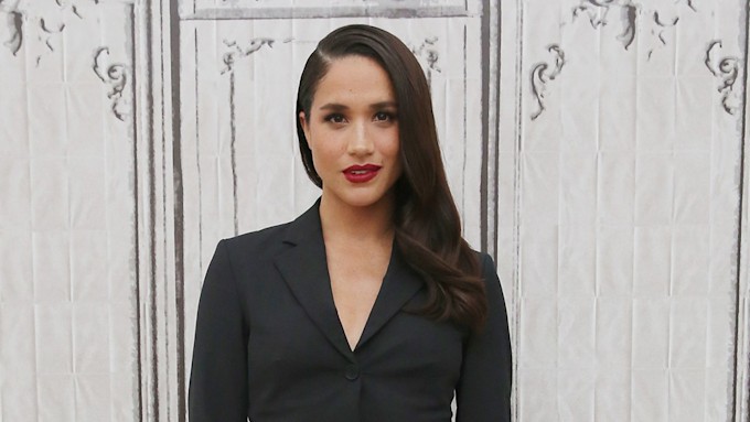 meghan markle in black blazer with red lipstick