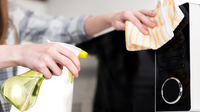 Cleaning microwave door
