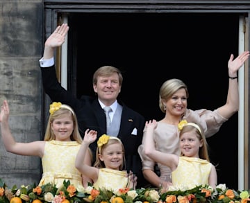 King Willem-Alexander and Queen Maxima appear on the balcony | HELLO!