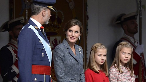 King Felipe and Queen Letizia joined by daughters at Spain's National Day parade