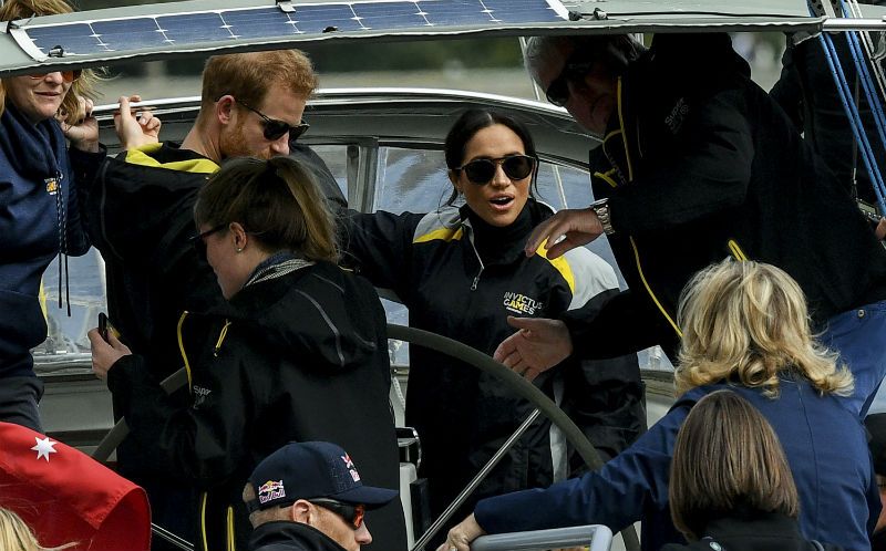 Prince Harry takes care of pregnant Meghan Markle during sailing final