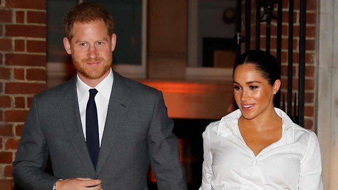 Prince Harry reveals Meghan Markle's carrying a heavy baby | HELLO!