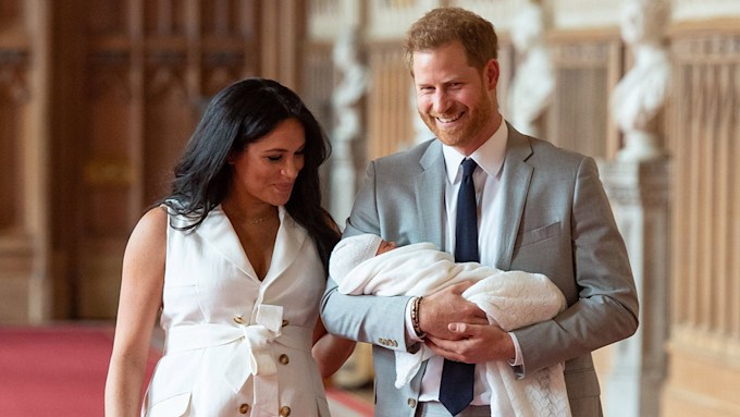 prince harry and meghan markle with royal baby