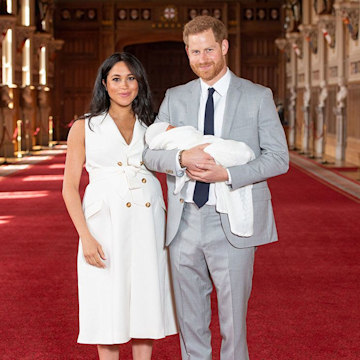 prince-harry-and-meghan-arms-wrapped