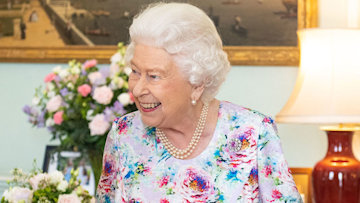 the queen in floral dress