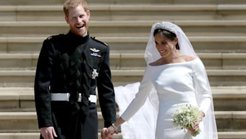 prince-harry-and-meghan-holding-hands-wedding
