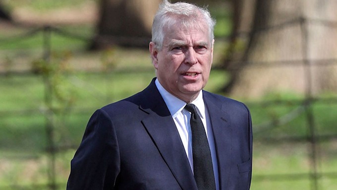 Prince Andrew supported by Sarah Ferguson as they arrive at Balmoral